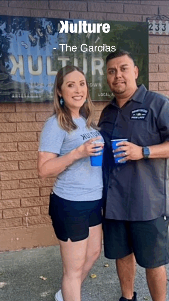 Owners of Kulture in front of shop