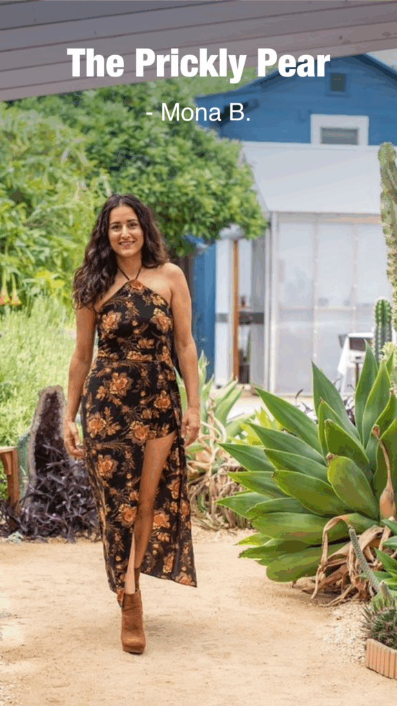 Woman walking next to succulents