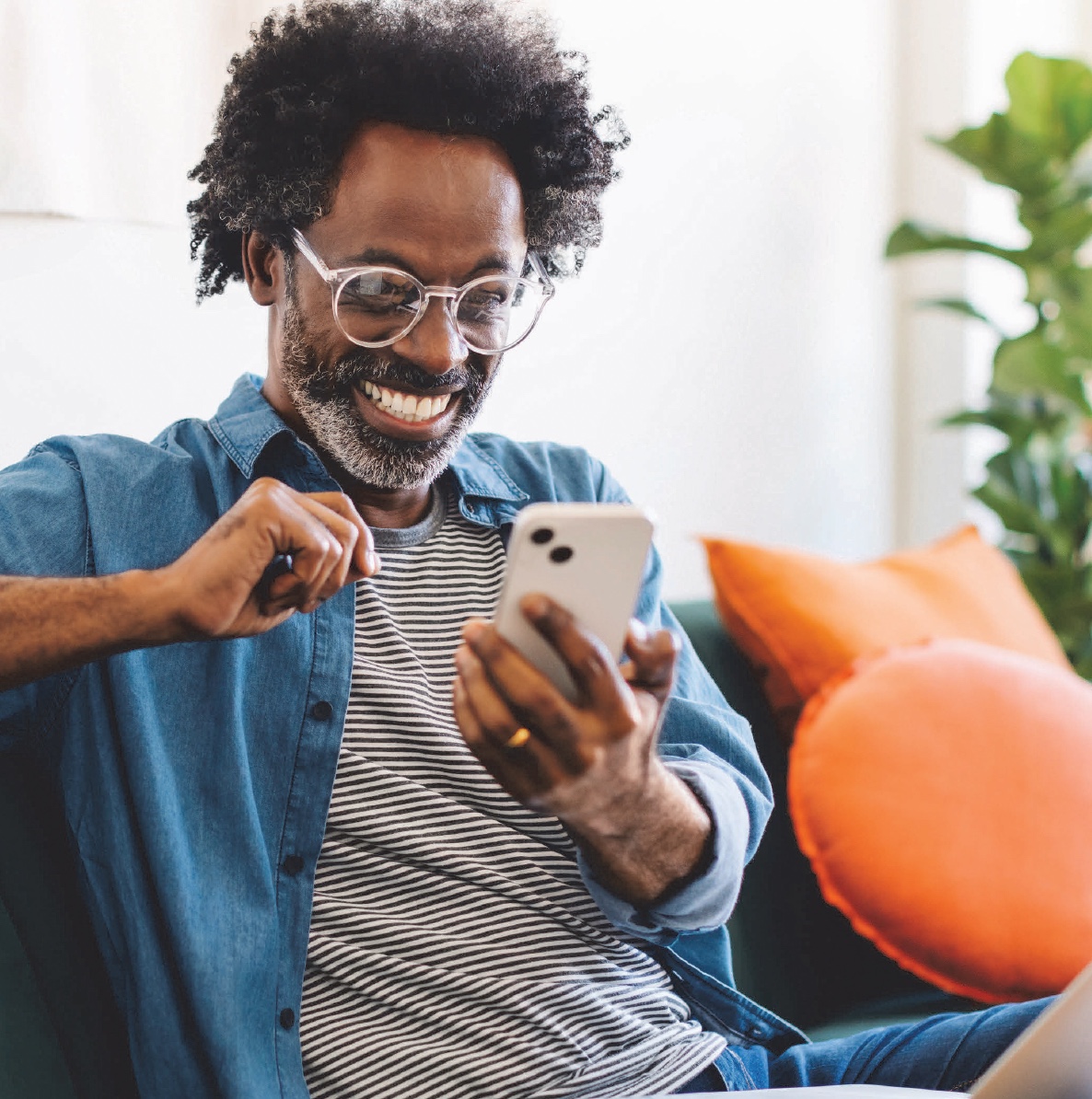 Black man looking at smartphone