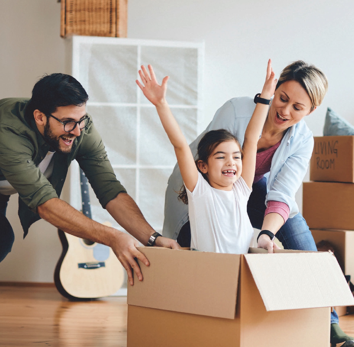 Family with moving boxes